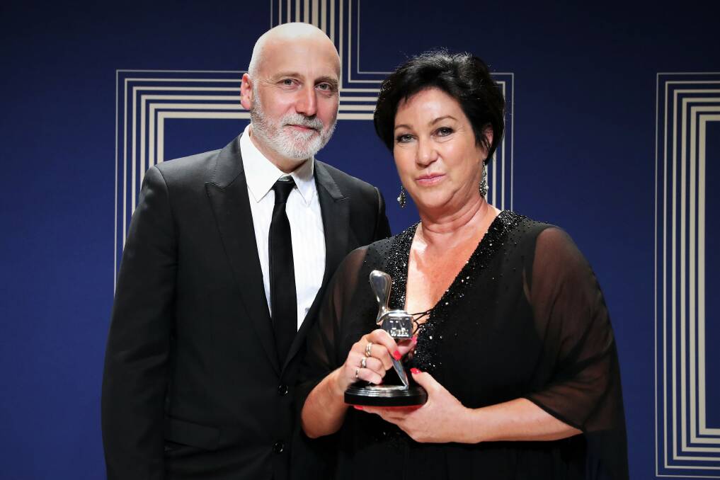 Vicki Madden accepts the Logie award for Most Outstanding Miniseries, for The Kettering Incident, in 2017, with co-creator Vincent Sheehan. Picture: Supplied 