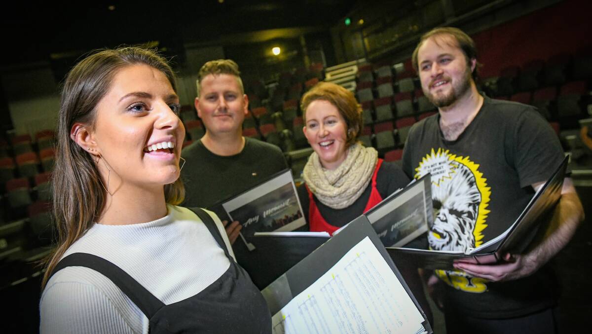 PREPARED: Jessie Singleton with Gerard Lane, Bil Heit and Aaron Beck rehearsing for new musical 'Any Moment'. Picture: Paul Scambler 
