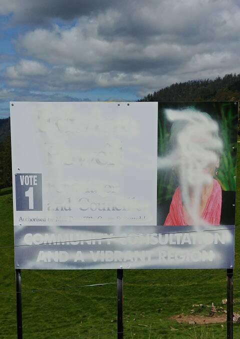 VANDALISM: This sign on the Tasman Highway belonging to Edwina Powell has been painted over. Picture: Supplied