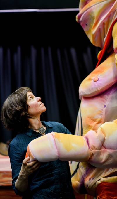 Puppet-maker Bryony Anderson makes an adjustment to Pa Ubu. Pictures: Scott Gelston 