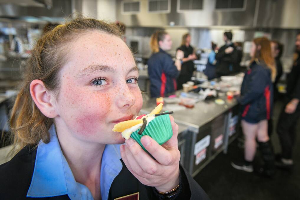 NEW SKILLS: Queechy High student Hayley Foon learning cupcake decorating at TasTAFE Drysdale. Picture: Paul Scambler 