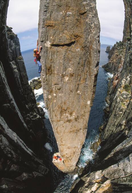 DIZZYING: Monique Forestier leading pitch two of the grade 25 route on the Totem Pole, Tasmania. Picture: Simon Carter