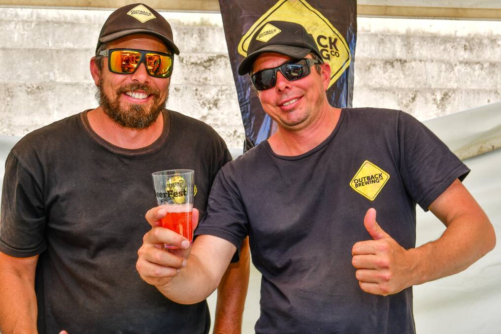 GLASS HALF FULL: Peter and Adam Watts of Outback Brewing were determined to enjoy themselves, despite a freighting mishap. Pictures: Scott Gelston