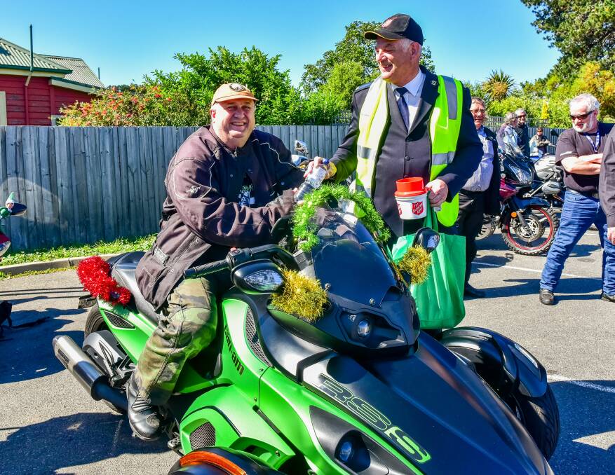 REVVED UP FOR CHRISTMAS: Matt Ess of Legana with Salvation Army brother Warren Reeve. Picture: Neil Richardson