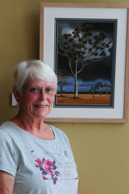 TALENT: Trudy Meijer of Launceston with her artwork on display at Windsor Community Centre. Picture: Paul Scambler