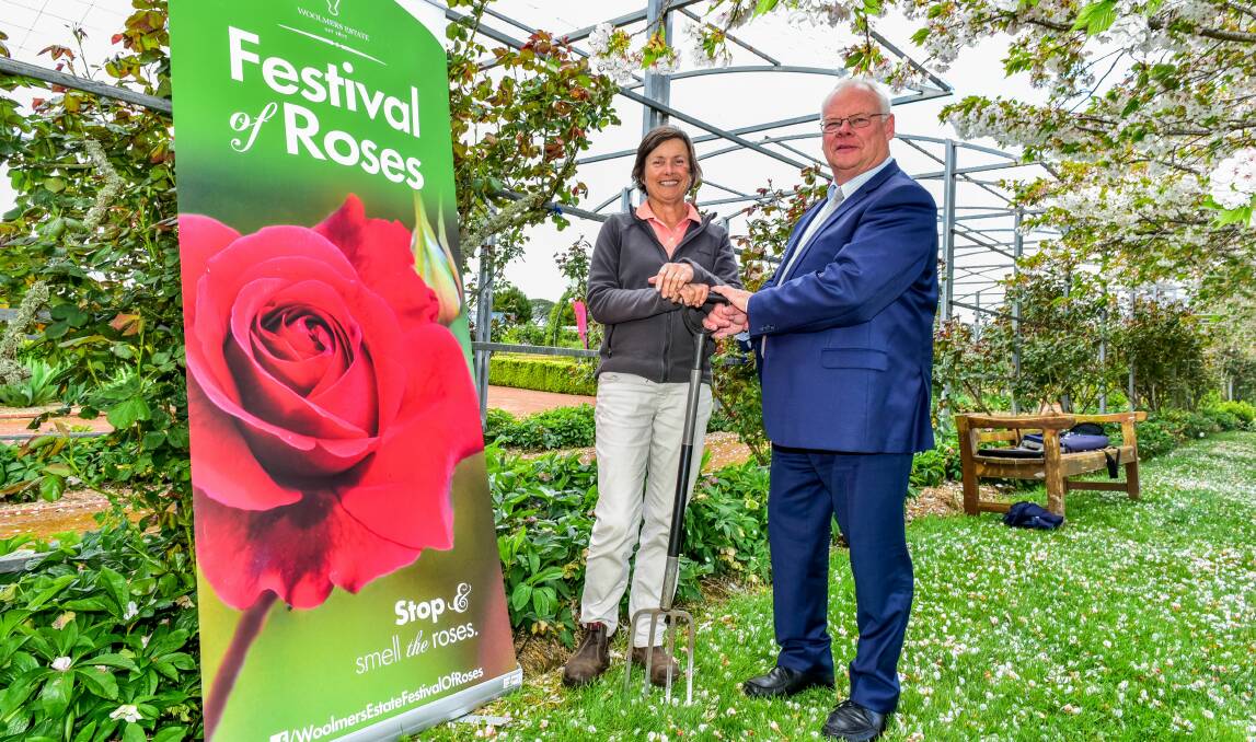 FESTIVAL BLOSSOMS: Volunteer co-ordinator Jane Harrison and Festival of Roses chairman Ian Goninon. Picture: Neil Richardson