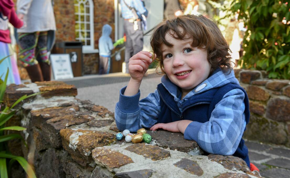 YUM: Benji Mainsbridge, 4, of Launceston, at the 2018 Easter egg hunt at Penny Royal. Picture: Paul Scambler