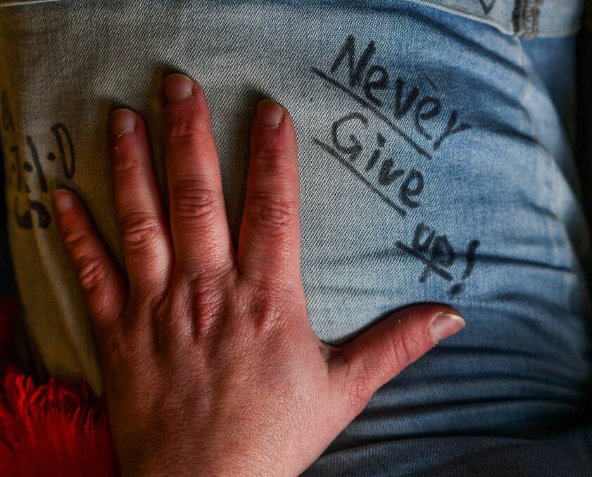 ABOVE: Eliana wrote motivational messages on her shorts to keep her going on the walk. Picture: Scott Gelston 