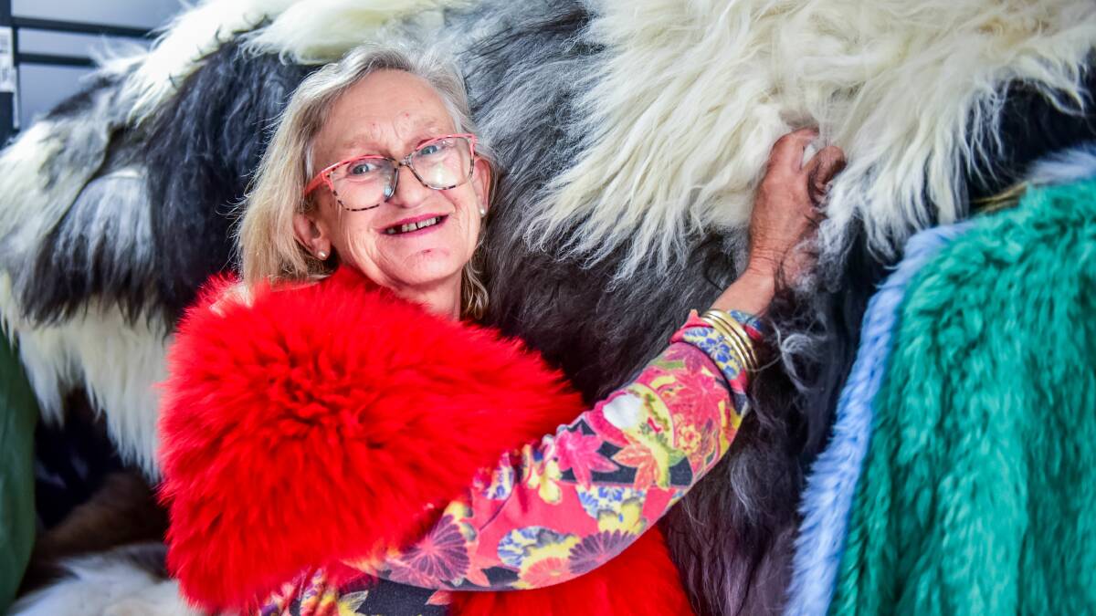 STYLE: Diane Briggs modelling one of her products, a fur throw. Picture: Neil Richardson