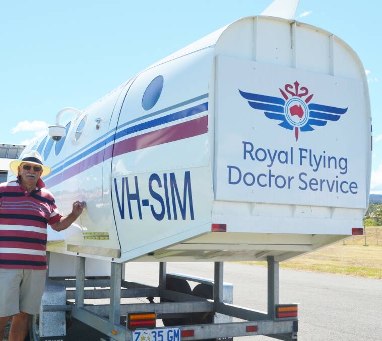 NEW EVENT: Outdoor Lifestyle Expo co-ordinator John Vinson with the Royal Flying Doctor's Service flight simulator at the Showgrounds. Picture: Frances Vinall 