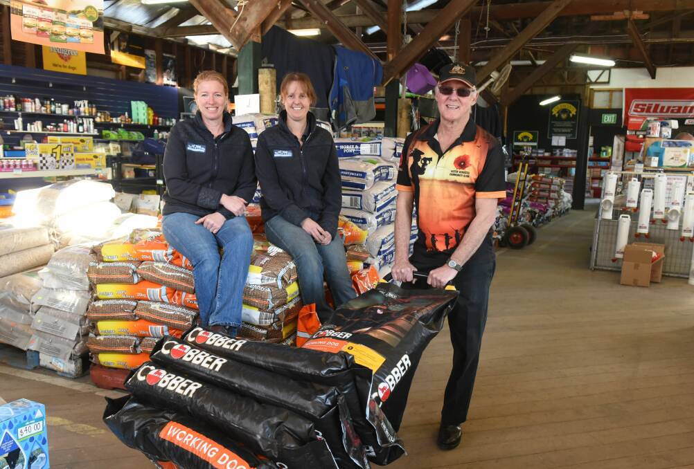 BIG HEARTS:  Exeter Farm & Feed owner Amanda Beans, store manager Jess Russell, and Exeter Services and Community Club president Tim Evans. Picture: Paul Scambler
