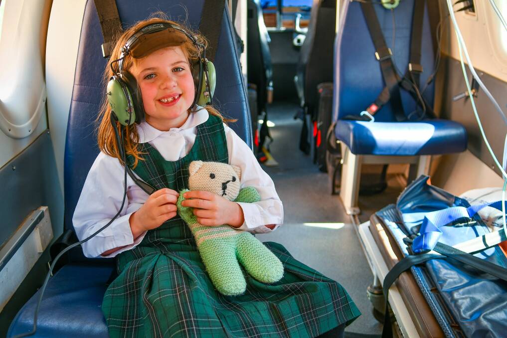 East Launceston Primary School students learned about the Royal Flying Doctors Service’s history, mission and activities, heard some real-life rescue stories, and hopped inside the fuselage to play doctors on Tuesday. Pictures: Scott Gelston