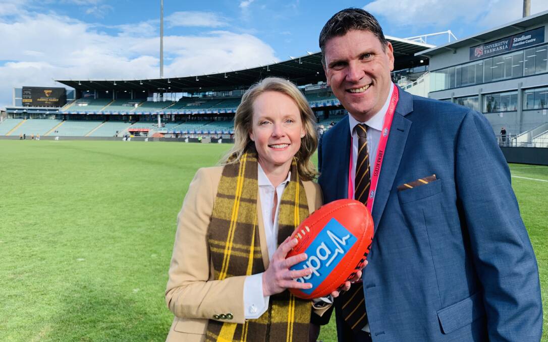 ON THE FIELD: Health Minister Sarah Courtney with Hawthorn Hawks chief executive Justin Reeves. Picture: Supplied 
