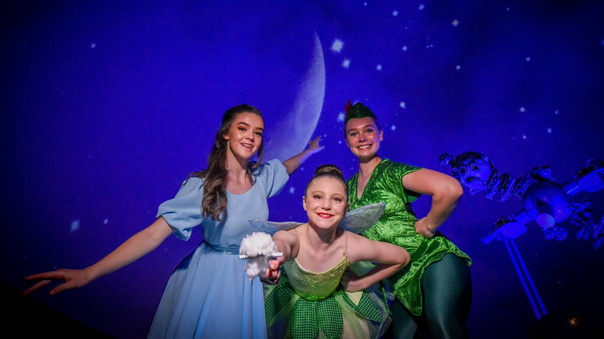 SHOOTING FOR THE STARS: Isobel Cooper, Eliza Kitto and Evie Dawkins in the Launceston Christmas Pantomime. Picture: Paul Scambler
