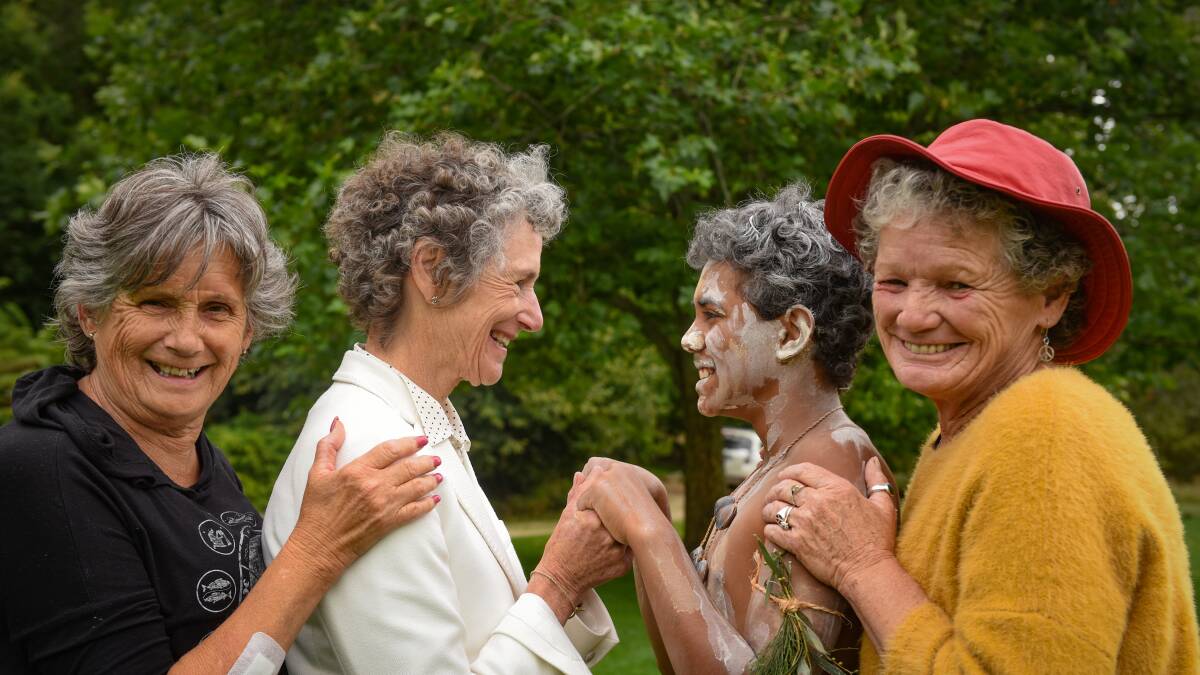 COMING TOGETHER: The Governor of Tasmania Kate Warner joins hands with traditional dancer 11-year-old Tyane Thomas,with elders Auntie Netty and Auntie Wendal. Picture: Paul Scambler