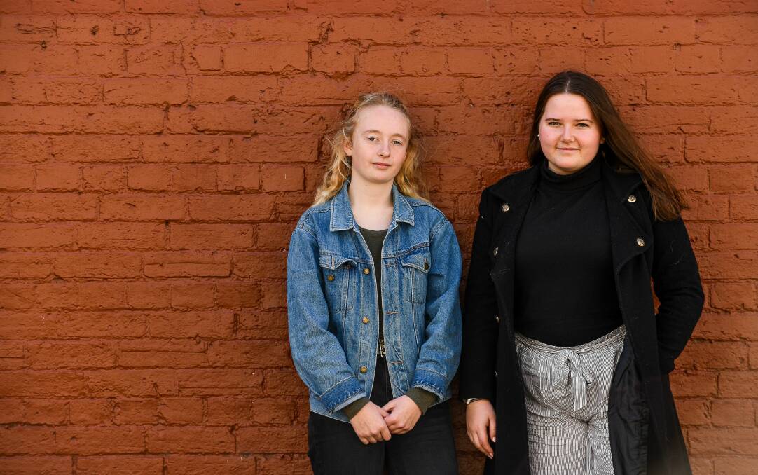 FIGHTING BACK: Gabrielle Dewsbury, 17, is the founder of the Launceston School Strike for Climate and Chloe McCann, 18, is one of the chief organising forces of the Launceston part of the Global Strike for Climate on September 20. Picture: Scott Gelston 