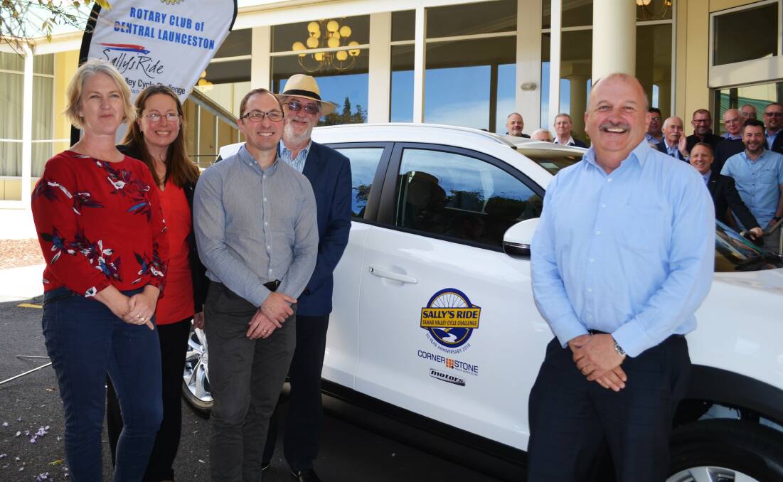 Sally's Ride co-chair Naomi Walsh, Rotary president Jodie Lowe, Cornerstone chief executive David O'Sign and chair Philip Morris, and Sally's Ride co-chair Alan Harris.  