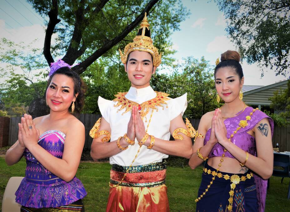 TRADITION: Yonlaphat Sukkul, Pratin Fongkaew, and Aeriya Dennienat prepare to perform at Evandale's Thai Food and Culture Festival. Picture: Frances Vinall 