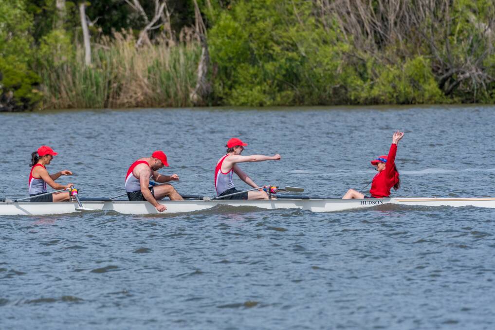 SUCCESS: The north team crosses the finish line first at the University of Tasmania North vs South Rowing Race. Pictures: Phillip Biggs 
