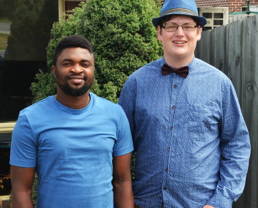 DIFFERENT PERSPECTIVES: Daniel Johnson (right) with support worker Omilani Tosin. Picture: Frances Vinall 