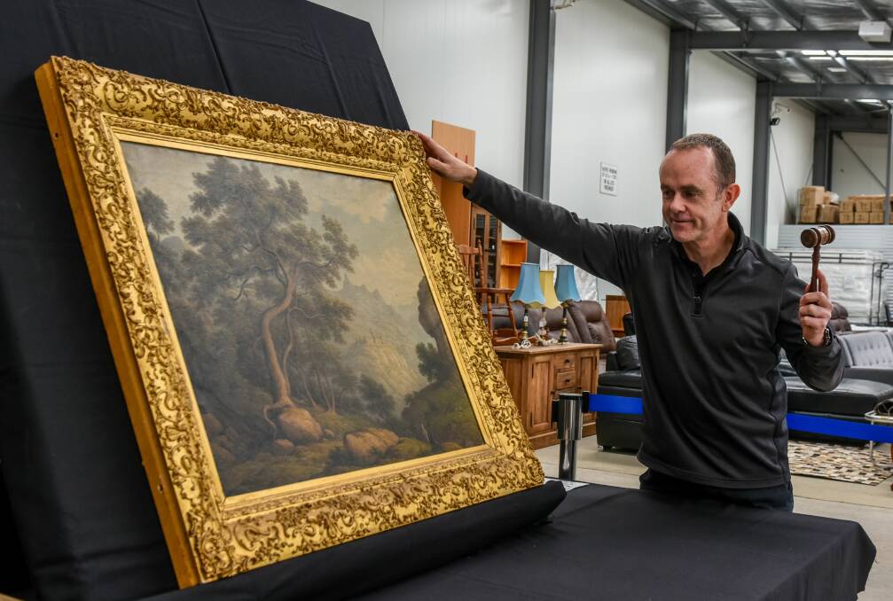 SOLD: Armitage Auctions auctioneer Neil O'Brien will sell two rare John Glover oil paintings on October 10. Picture: Frances Vinall