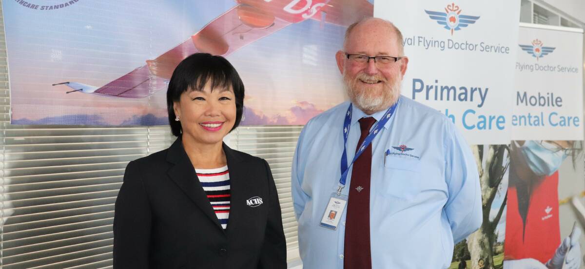 CELEBRATING: Australian Council on Healthcare Standards executive director Dr Lena Low and Royal Flying Doctor Service Tasmania CEO John Kirwan. Picture: Supplied