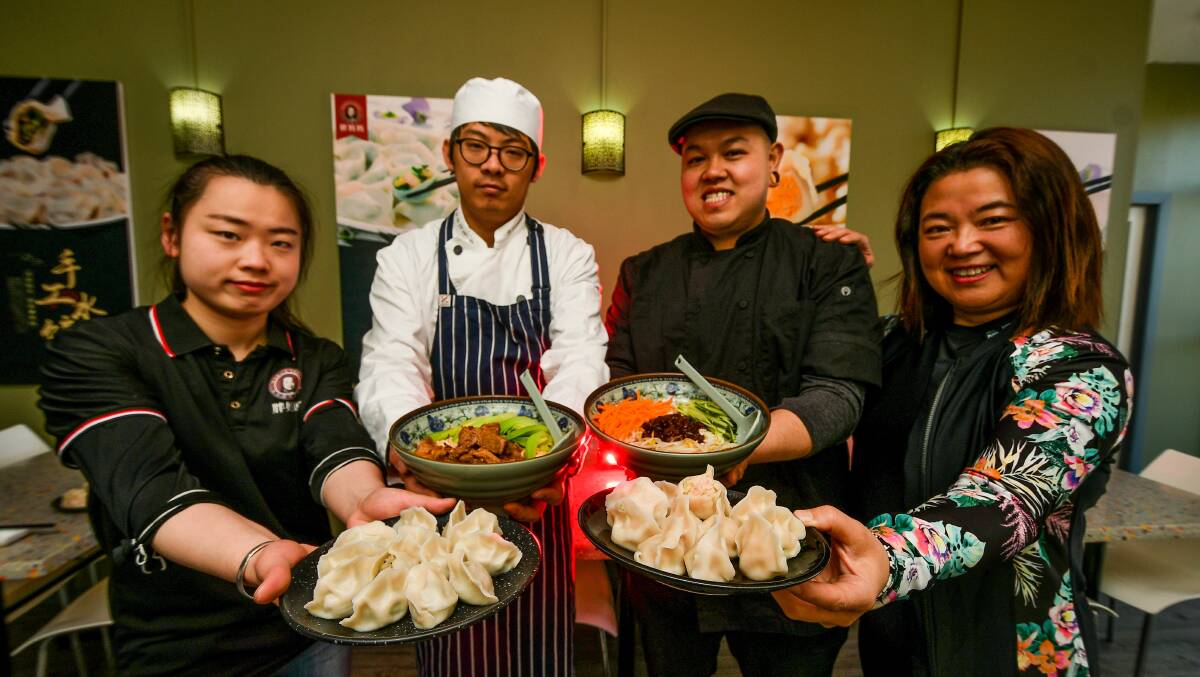DELICACIES: Kelsey, Kun, Eustace and Nancy Wong with a selection of dishes including the sea urchin dumplings that will be at the Taste of Tasmania. Picture: Scott Gelston 