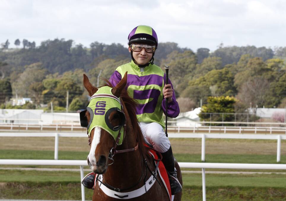 Jockey Peter Lui makes a successful return to the mounting yard on Gee Gees Cricket. Picture: Brad Cole.