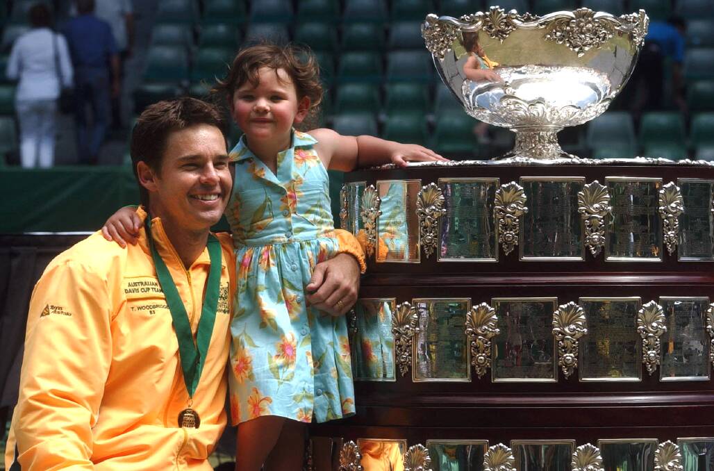 Not consulted: Todd Woodbridge, seen here with the Davis Cup in 2003, voiced his disapproval of the changes over social media. Picture: AAP Image/Julian Smith.