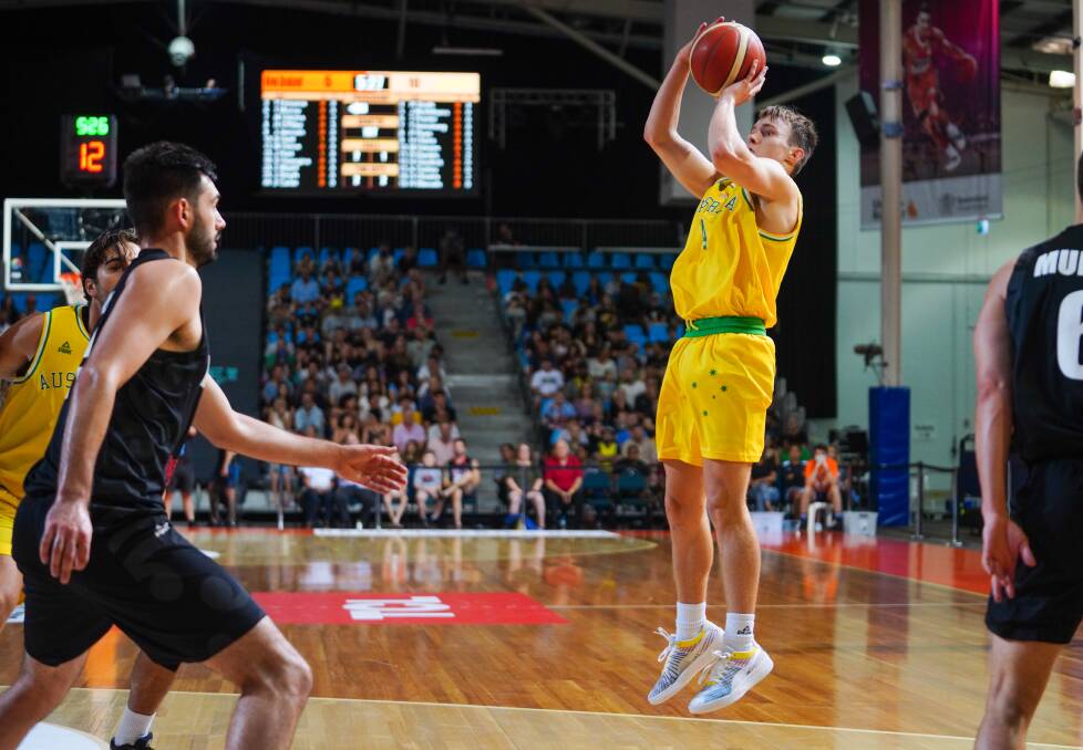Sharpshooter: Reyne Smith puts up a shot in Saturday night's win. Picture: Cameron Laird/FIBA.