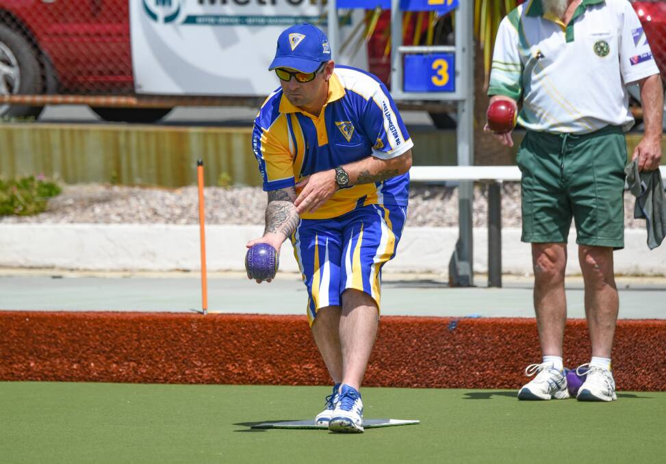 Best foot forward: East Launceston's Barry Street lines up his backhand shot during the Bowls North Saturday Pennant match against Westbury. Picture: Paul Scambler.