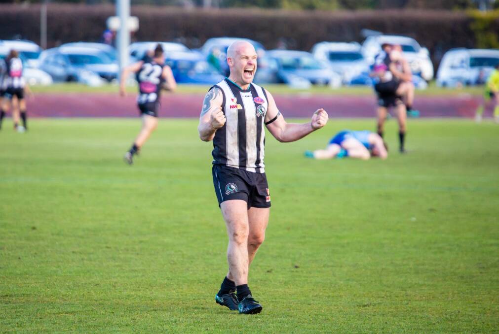 JOY: Devonport's Nick Milbourne celebrates as the final siren sounds at the end of the NWFL grand final. Picture: Eve Woodhouse.
