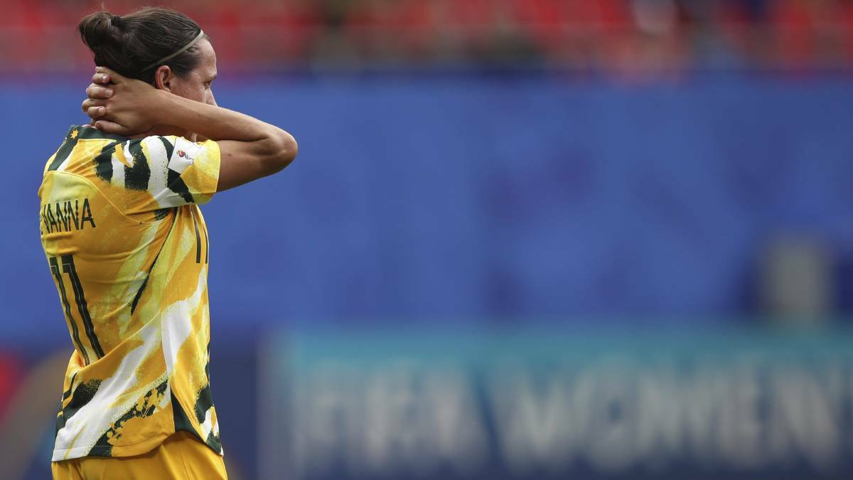  Australia's Lisa De Vanna holds her head after the loss. Photo: AP 