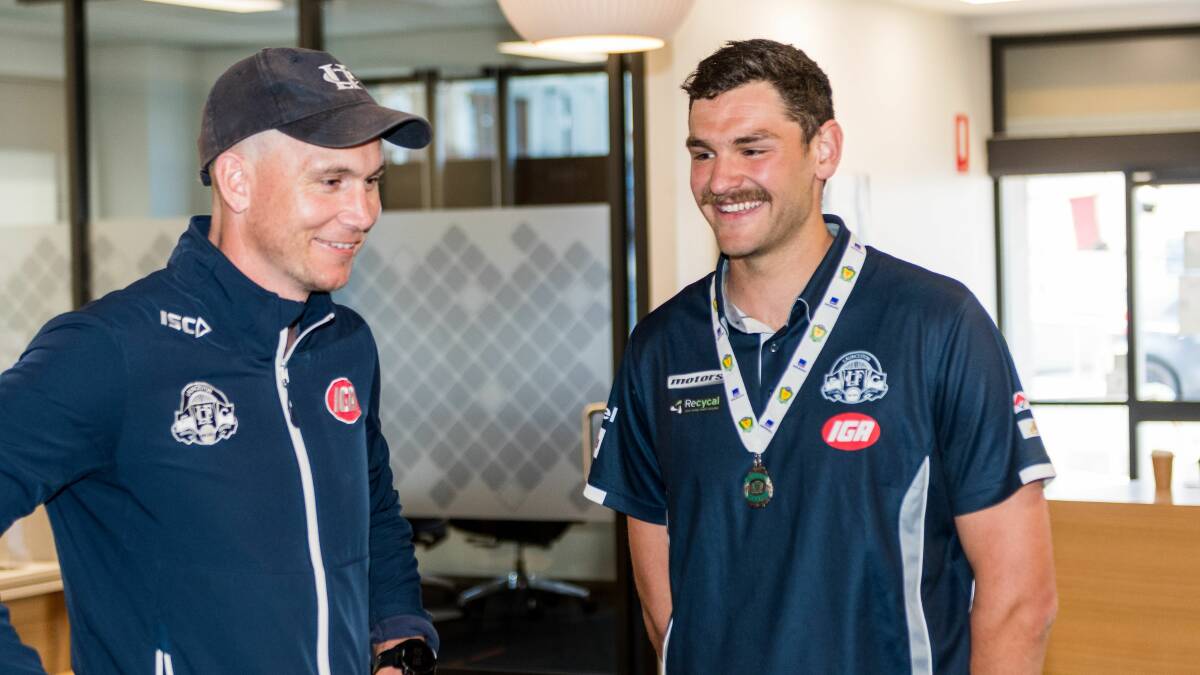 Hamish Leedham (right) with coach Mitch Thorp. Leedham finished grand final week with three medals. 