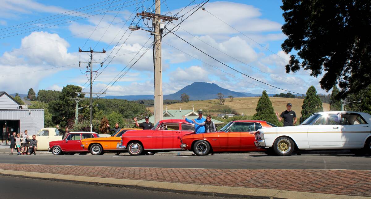 IMPRESSIVE LINEUP: Organisers prepare for this Sunday's Deloraine Street Car Show. Pictures: Hamish Geale 