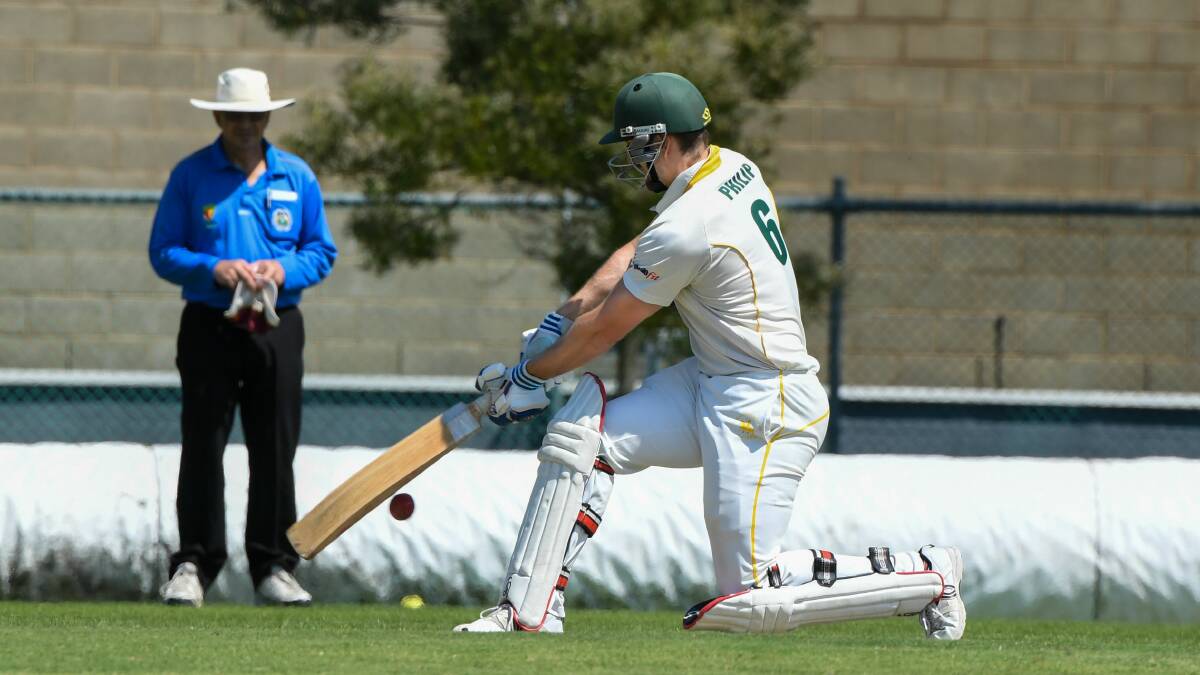 UNSTOPPABLE: Nathan Philip sweeps on his way to an eighth Cricket North hundred last Saturday. Picture: Neil Richardson 