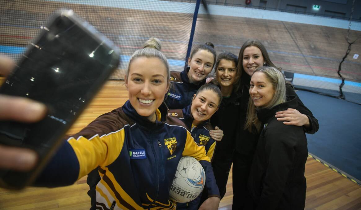 ALL IN: Northern Hawks and Cavaliers players share a selfie ahead of Saturday's grand final. Picture: Paul Scambler 