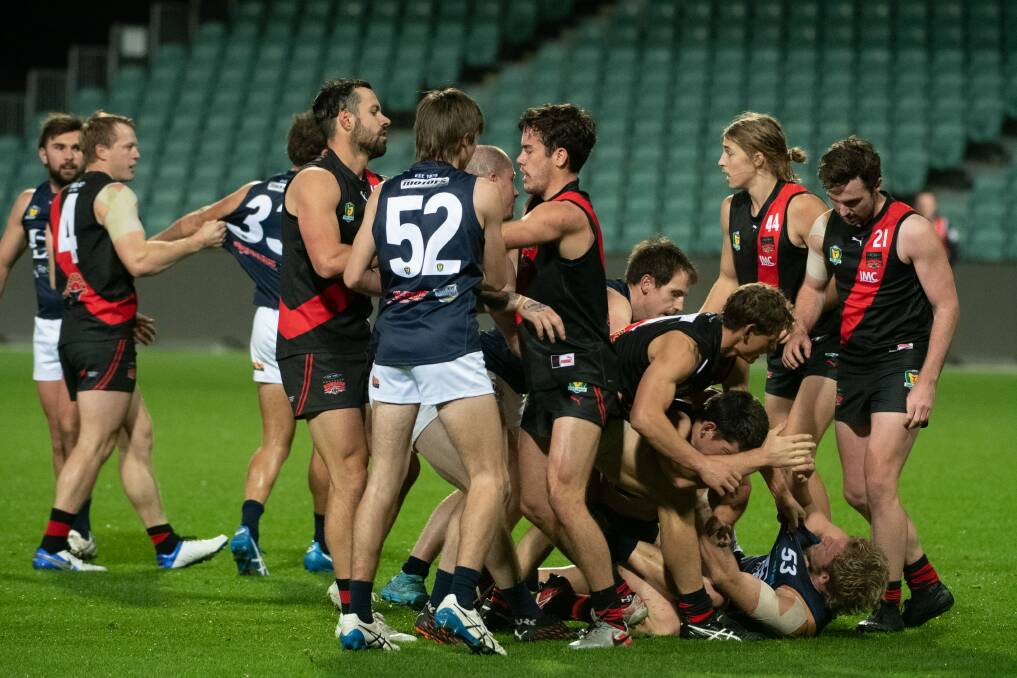 FIERCE RIVALS: Launceston and North Launceston players engage in scuffle following Cody Thorp's bump on Billy Edmunds. Picture: Craig George