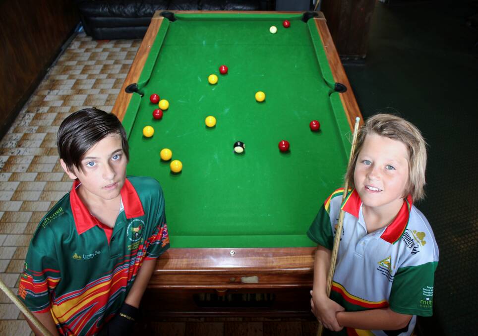 RIGHT ON CUE: Tasmanian 12-year-old eightball players Alex Rigby and Mitchell Shadbolt will represent the state at this weekend's junior nationals in Launceston. Pictures: Hamish Geale
