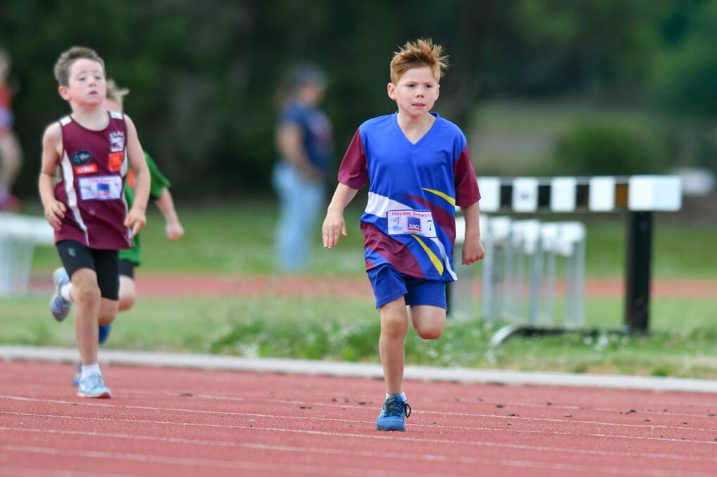 DETERMINED: Launceston's Hayden Brewster competes in the under-7 boys' 200 metres at St Leonards. Picture: Scott Gelston