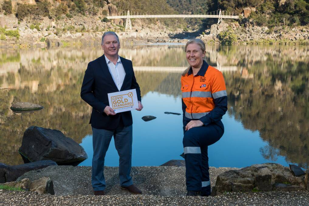 Chris Griffin and Bell Bay Aluminium general manager Shona Markham launch the COVID-19 Gold Standard program in 2020. Picture by Phillip Biggs