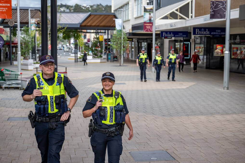 Constables Hamish Fife and Olivia Walker (left) with Constables Jarrod Ison, Paige Kroon and Senior Constable Adam Upston in the Brisbane Street Mall. Picture by Paul Scambler
