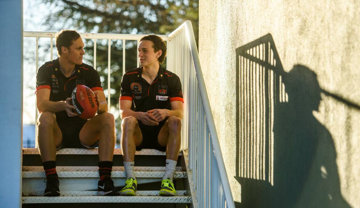LIKE FATHER, LIKE SON: Bombers pair Connor Young and Rhyan Mansell are hoping to follow in their fathers' footsteps by winning a flag with North. Picture: Scott Gelston.