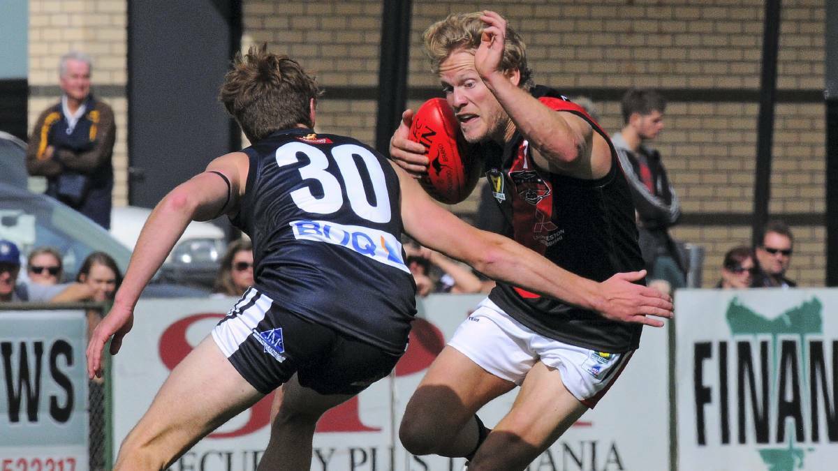 150-gamer Shane Wager in action for North Launceston in 2013.