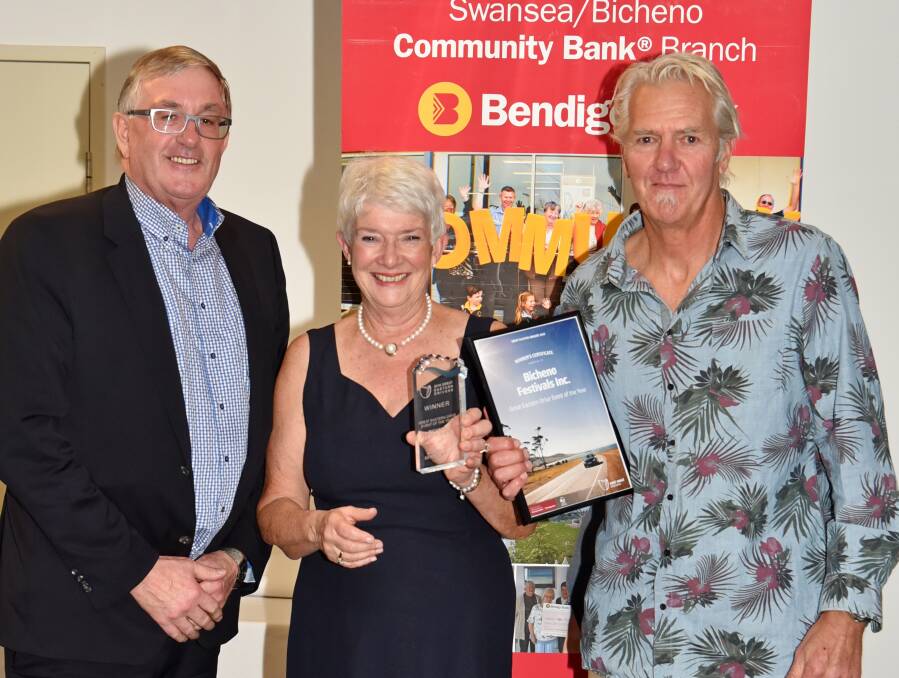 WINNERS: Infrastructure Minister Rene Hidding presents Event of the Year to Bicheno Food and Wine Festival organising committee's Jenny Logie and Chris Blogg.