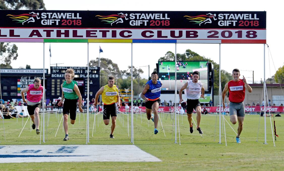 ICONIC: Sprinter Jacob Despard from Tasmania crosses the finish line in red to win the 2018 Stawell Gift. Picture: AAP
