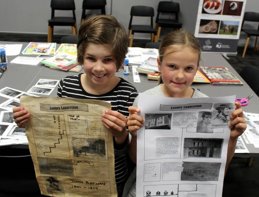 EDITORS FOR A DAY: Lincoln Giasli, 10, of Glengarry, and Olivia McLeod, 7, of Newstead, compiled Looney Launceston newspapers for LINC's school holiday program. Picture: Hamish Geale 