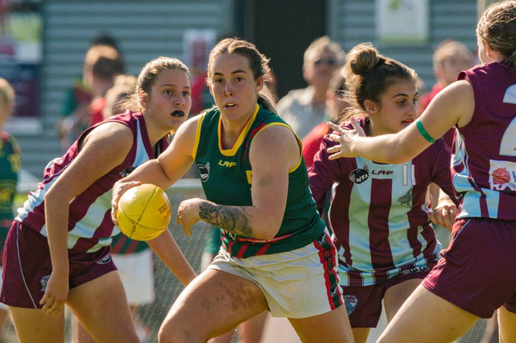 UP AND DOWN: Northern Tasmania has experienced a rise in women's football teams and a decrease in men's teams in the past decade. 