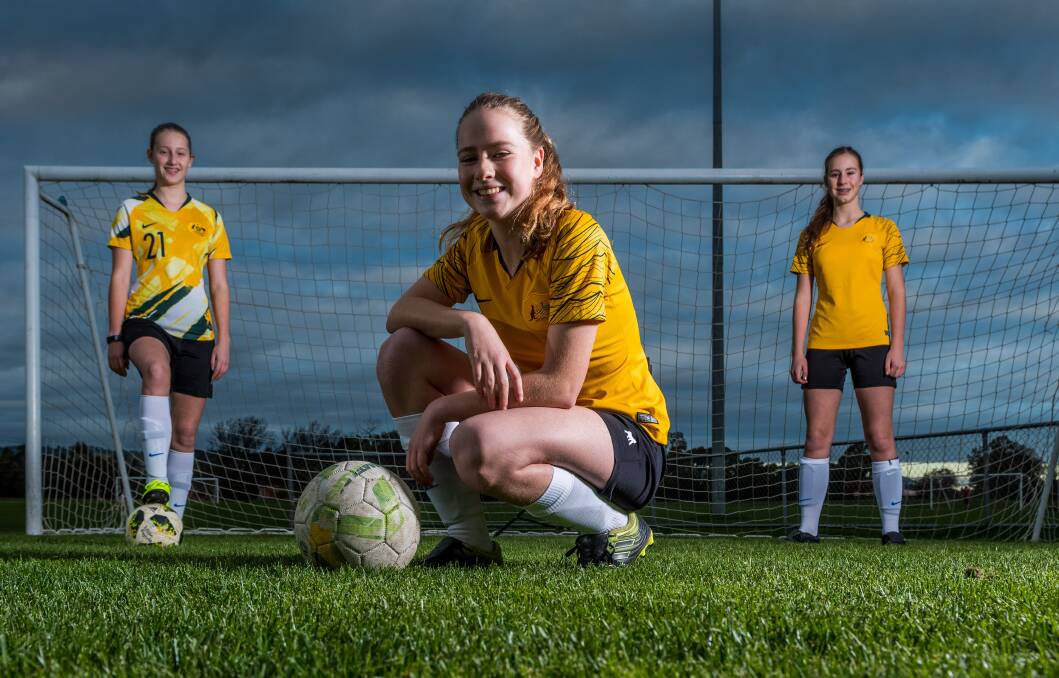 HOPEFUL: Launceston United young guns Neve Farquhar, (front), Lilian Reynolds, (left) and Ava Farquhar, (right). Picture: Phillip Biggs.