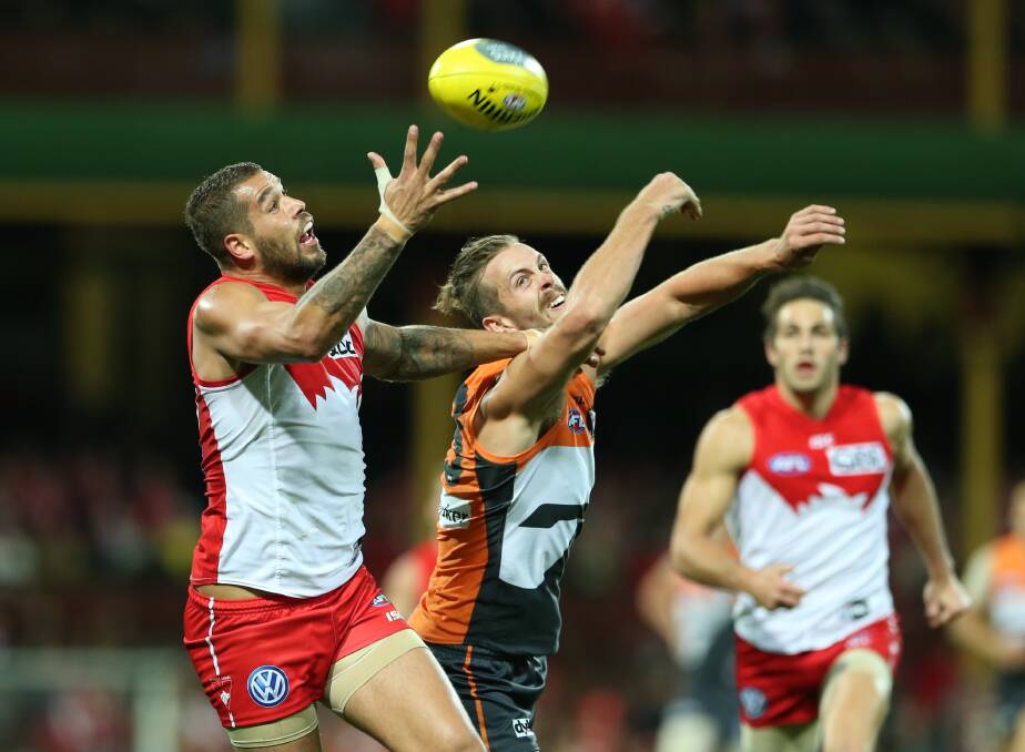 LUCKLESS: Giant Tim Mohr in a marking contest with Sydney's Lance Franklin. Picture: Anthony Johnson